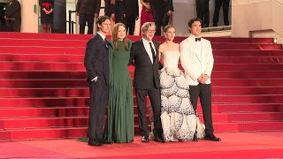 Natalie Portman and Julianne Moore walk the Cannes red carpet for May December  AFP