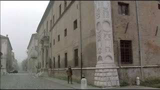 Beyond the Clouds 1995 by Michelangelo Antonioni Clip Silvano walks down a street in Ferrara