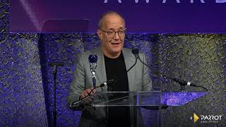 Friends CoCreator David Crane accepts the Global Iconic Demand Award from Parrot Analytics