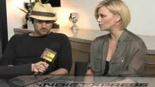 Charlize Theron and Martin Henderson  BATTLE IN SEATTLE