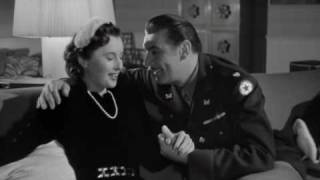Barbara Stanwyck and George Brent in the movie My Reputation