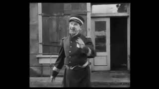 Charlie Chaplins Easy Street 1917
