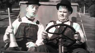 Laurel  Hardy  Stans Good Idea Towed In A Hole