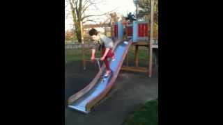Tom Crisp falls off the slide