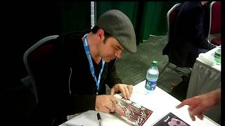Actor Jed Rees signing autographs