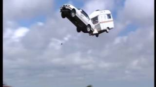 Derek Lea stuntman smashes world record for longest jump with a car towing a caravan