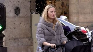 Australian actress Melissa George walking her baby in the streets of Paris