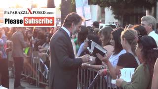 Harry Van Gorkum greets fans outside premiere of The Mortal Instruments City of Bones at ArcLight Th