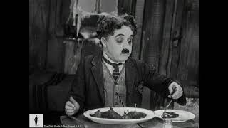 Charlie Chaplin eats his shoe for Thanksgiving  The Gold Rush 1942 version
