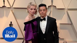 Love Doves Rami Malek and Lucy Boynton embrace at 2019 Oscars