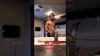 Shirtless Aramis Knight sings in the bathroom