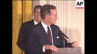 President George H W Bush unveils portraits of Ronald and Nancy Reagan