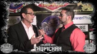 Filmmaker James Wilson speaks with Louis Velazquez at the Action Martial Arts Hall of Honors