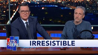 Jon Stewart Climbs Out From Under Colberts Desk To Debut Irresistible Movie Trailer