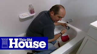How to Clear a Clogged Bathtub Drain  This Old House