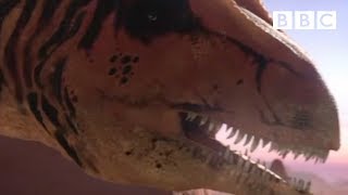 A deadly Allosaurus ambushes its prey  Planet Dinosaur  BBC