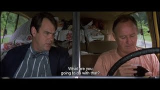 Gene Hackman rolling in a moving car in Loose Cannons 1990